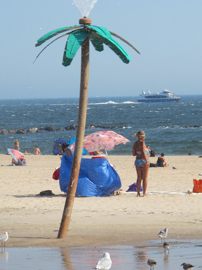 Coney Island beach and plastic palm tree