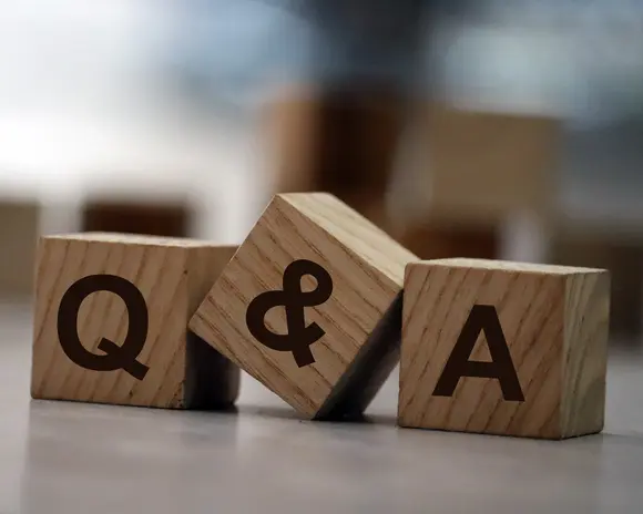 Wooden cube with Q & A